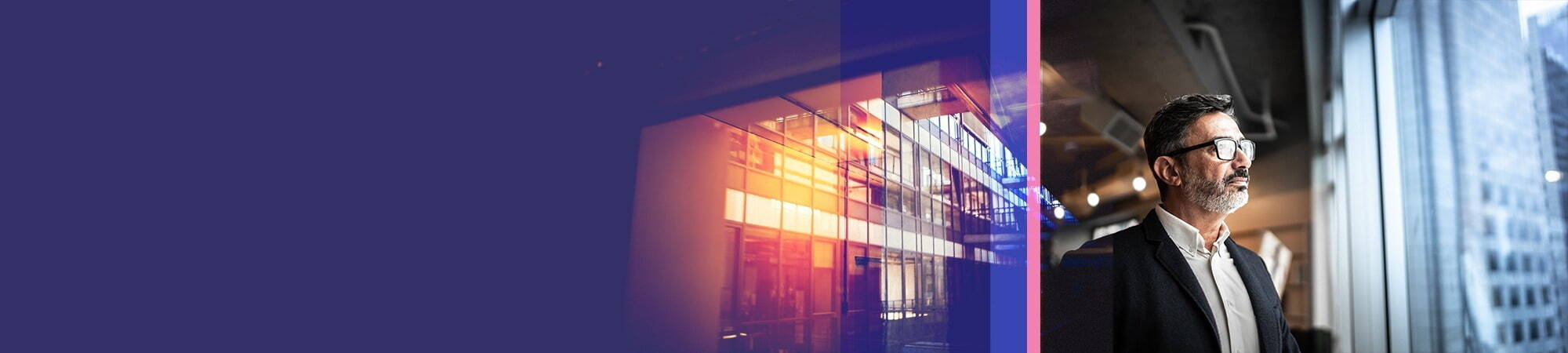 7.	A man looking thoughtfully through warm, tinted reflections of a building’s windows, set against a dark purple background