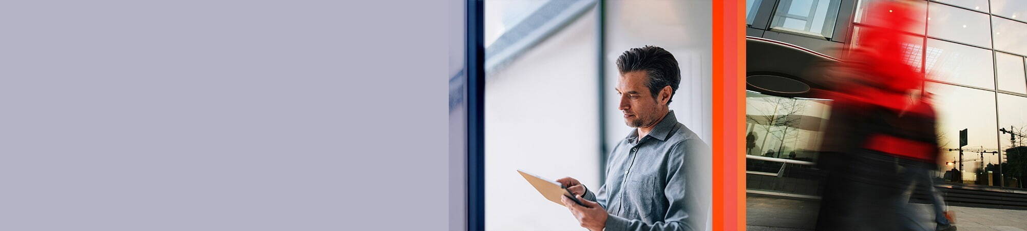 A gray block on the left, a man holding a tablet in the center, and a blurred red figure striding past a modern glass building on the right.